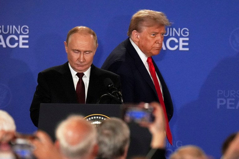 President Donald Trump Russia's President Vladimir Putin arrive for a joint press conference at Joint Base Elmendorf-Richardson, Alaska, Friday, Aug. 15, 2025. 