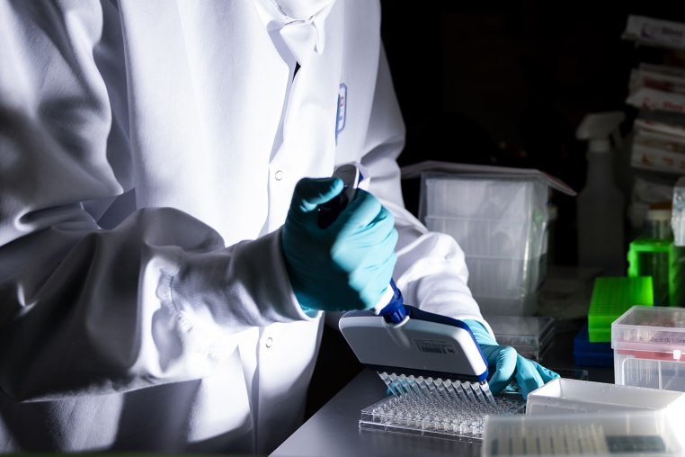 A researcher works in the lab at the Moderna Inc. headquarters in Cambridge, Mass., March 26, 2024. 