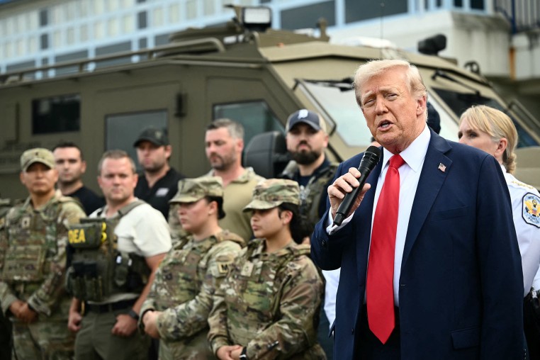 President Donald Trump speaks while visiting federal troops at the U.S. Park Police Anacostia operations facility in Washington, D.C., on Aug. 21, 2025. 
