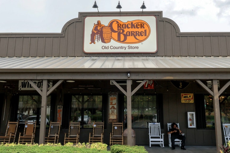 A Cracker Barrel sign featuring the old logo hangs on the outside of a restaurant on Aug. 21, 2025 in Homestead, Fla.