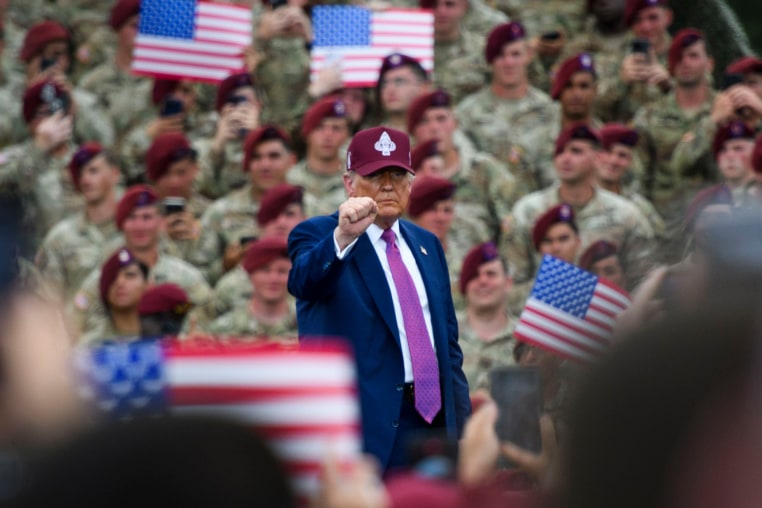 President Donald Trump leaves the stage after speaking at a rally with U.S. Army troops on June 10, 2025 at Fort Bragg, N.C.