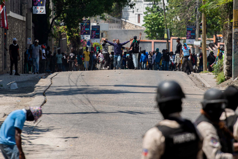 Police confront citizens.