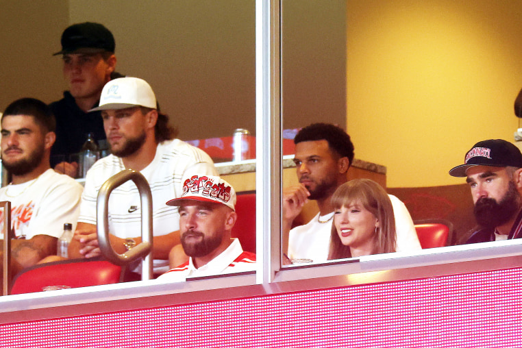 Travis Kelce, Taylor Swift, and Jason Kelce.