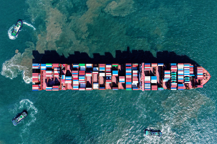 A container ship sails out of the port in Qingdao, China, on Sept. 4, 2025. 