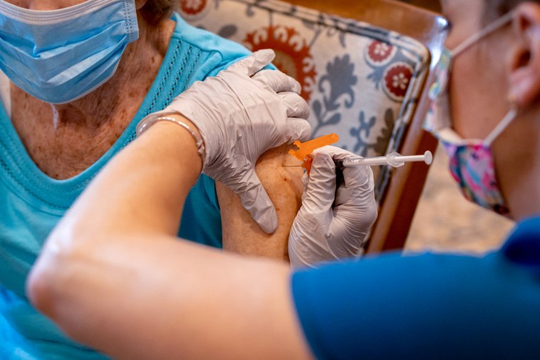 Senior patient getting vaccine.