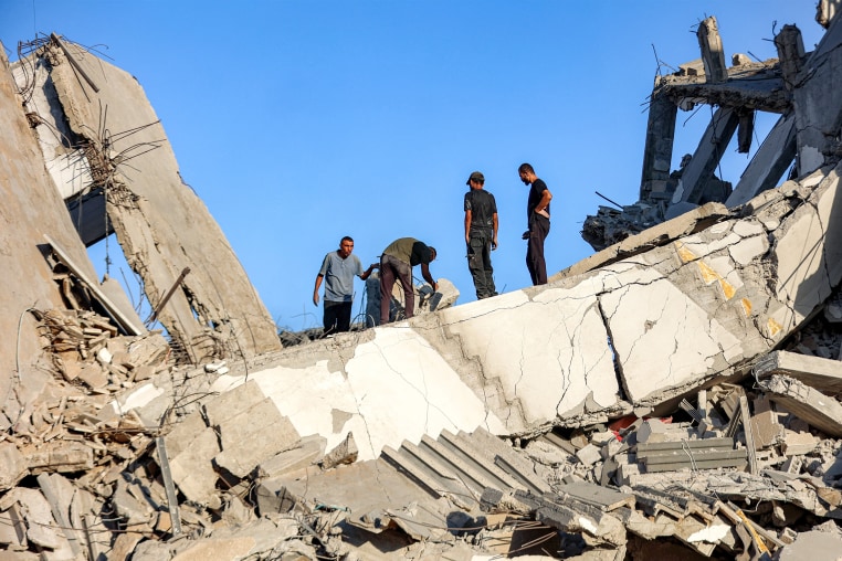 Image: palestinian Israeli conflict gaza city debris aftermath building destruction