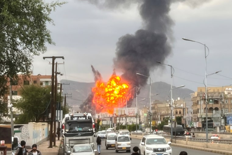 Flames and smoke rise following Israeli airstrikes in Sanaa, Yemen