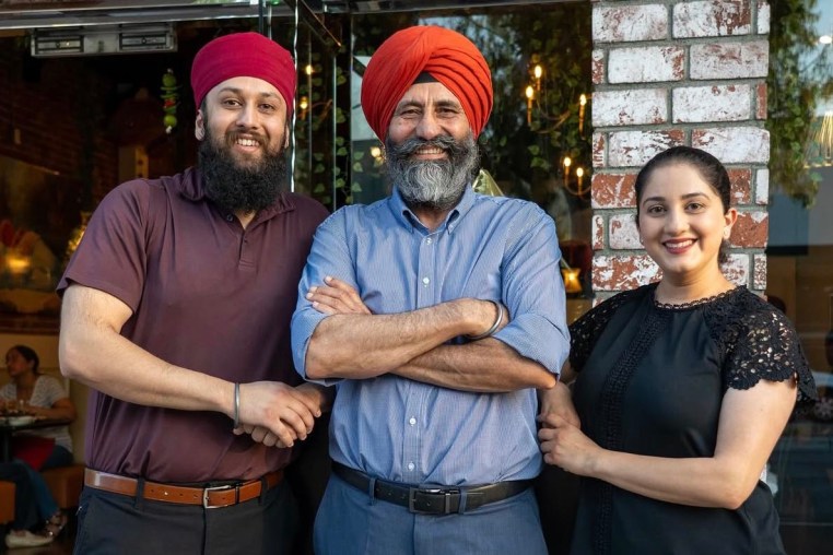 Harsimran Singh, Santokh Singh Khinda and Pawandeep Kaur Khinda outside All India Cafe’s Arcadia, California location.