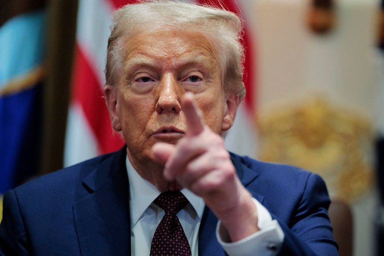 President Donald Trump calls on a reporter during a Cabinet meeting on Aug. 26, 2025.