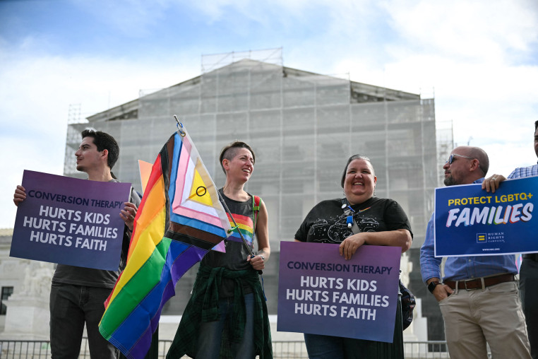 Demonstrators protest against conversion therapy outside the Supreme Court 