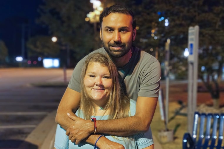 Kapil Raghu and his wife Ashley Mays.