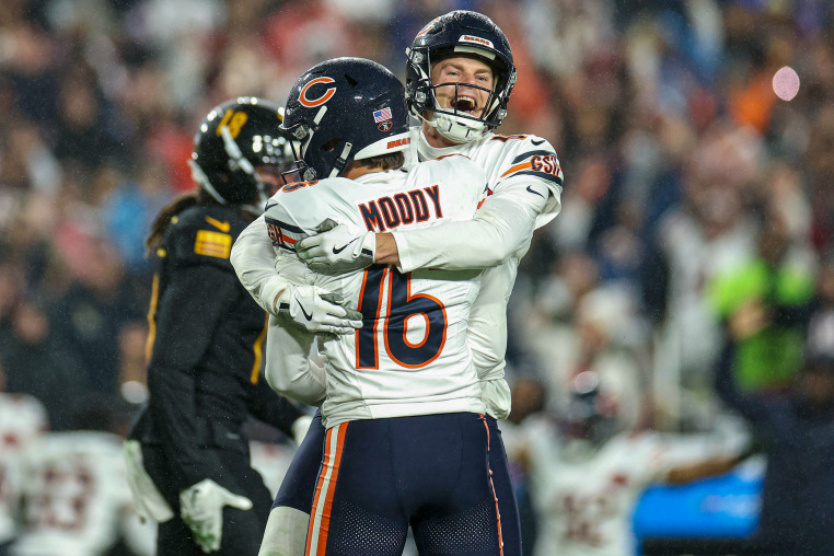 Jake Moody celebrates with Tory Taylor of the Chicago Bears.
