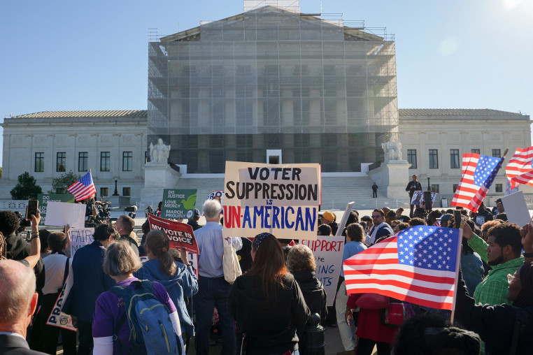 Demonstrators outside the Supreme Court on Wednesday, Oct. 15, 2025. 