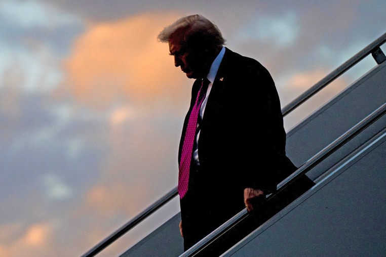 President Donald Trump disembarks from Air Force One upon arrival in West Palm Beach, Fla., on Oct. 17, 2025, as he travels to Mar-a-Lago for the weekend. 