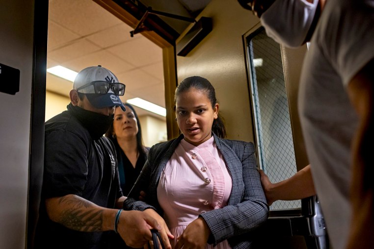 Federal agents detain a nine-month pregnant women after