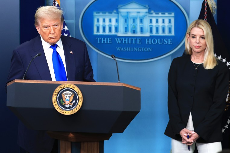 Donald Trump and Pam Bondi in the briefing room at the White House.