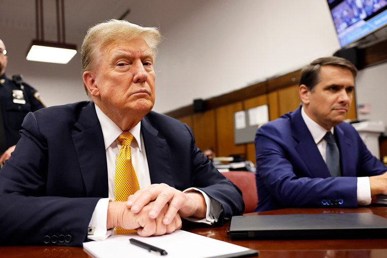 Donald Trump and Todd Blanche.