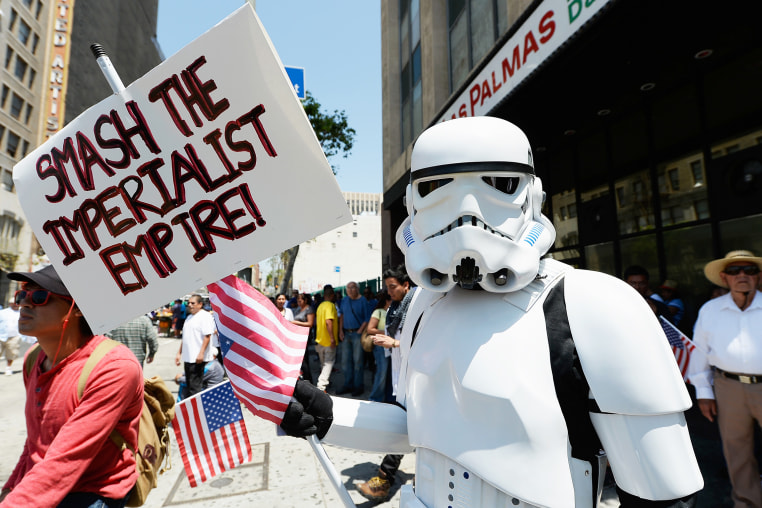 A demonstrator wearing a Star Wars storm trooper uniform.