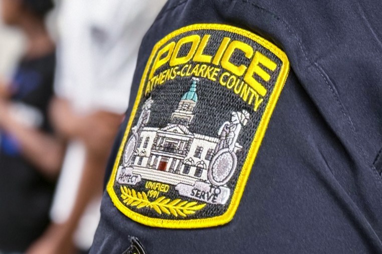Close up of an Athens-Clarke County police officer's patch on the shoulder of their uniform
