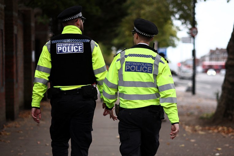 Metropolitan Police officers patrol the streets of north London.