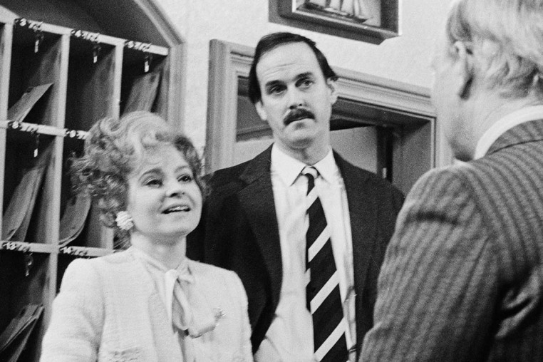 Prunella Scales and John Cleese  in a scene "Fawlty Towers."