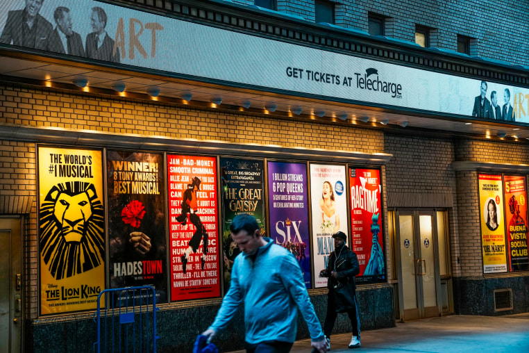 People walk past a Broadway theater in Times Square on October 21, 2025 in New York.