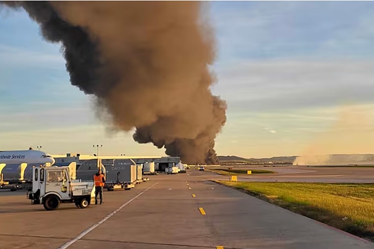 Crews reporting to large fire at Muhammad Ali Airport after reported plane crash on Nov. 4, 2025 in Louisville, Kentucky.