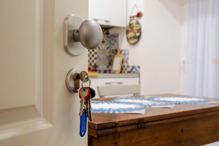 Apartment door open.