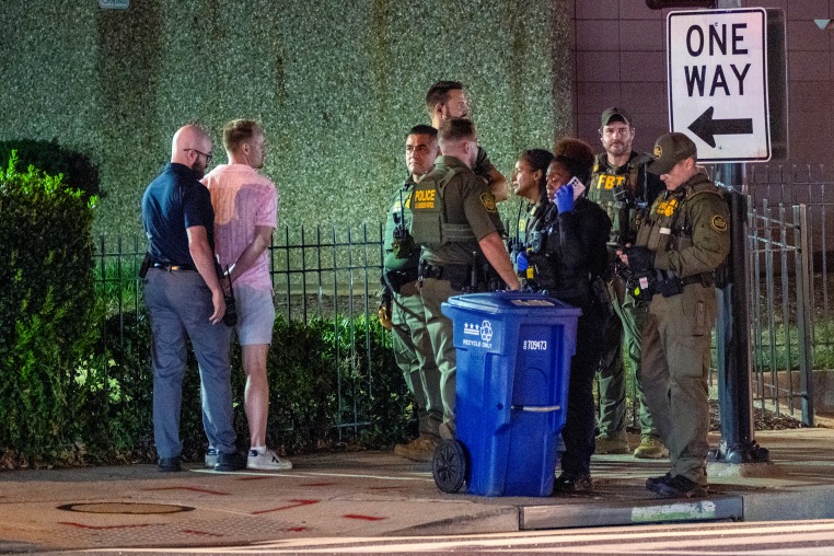 FBI and Border Patrol officers arrest Sean Charles Dunn.