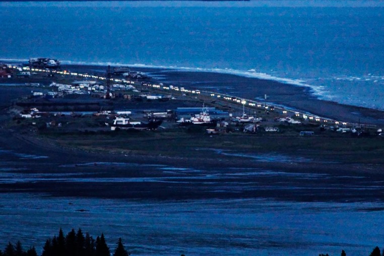 Headlights shine as people evacuate the Spit in Homer, Alaska, following a powerful earthquake in the Aleutian Islands that prompted a tsunami warning on July 22, 2020. 