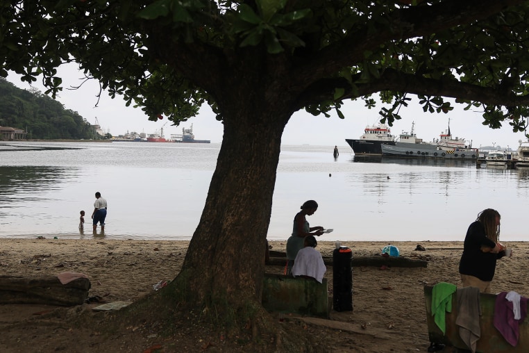 People along the Gulf of Paria in Port of Spain, Trinidad and Tobago.