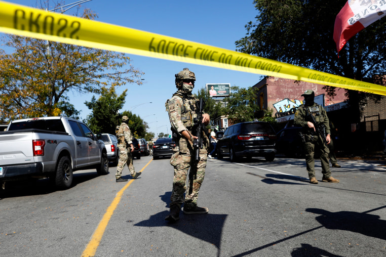 Masked US Customs and Border Protection (CBP) Border Patrol agents.