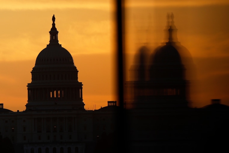 The U.S. Capitol is seen at sunrise.
