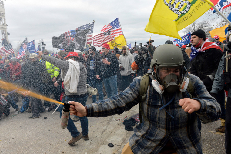Trump supporters clash with police and security forces on Jan. 6, 2021 as people try to storm the US Capitol Building.