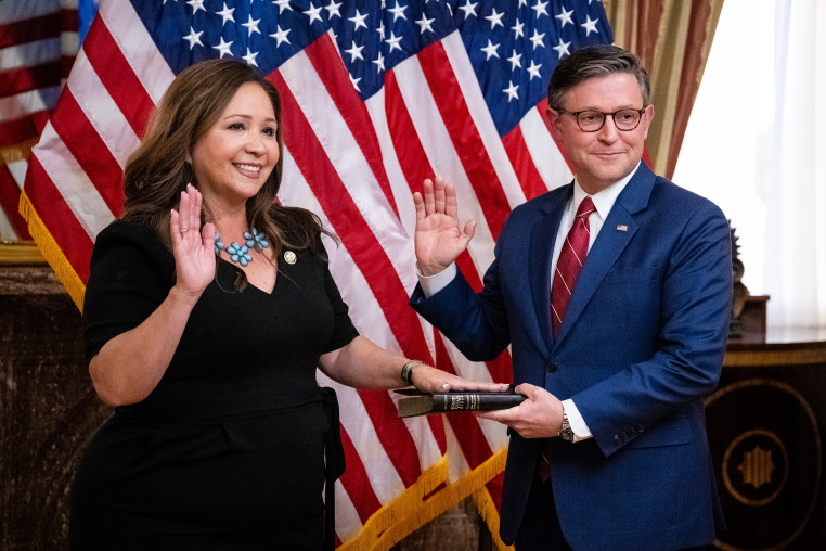 Rep. Adelita Grijalva and US House Speaker Mike Johnson during a ceremonial swearing-in ceremony at the Capitol.