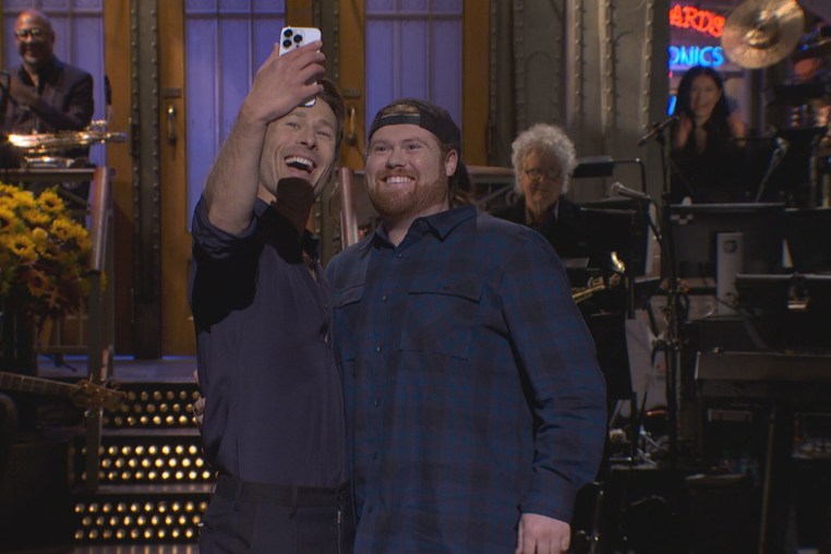 Image: Glen Powell and Mitch the UPS guy.