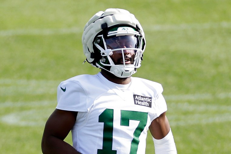 Kris Boyd runs on the football field