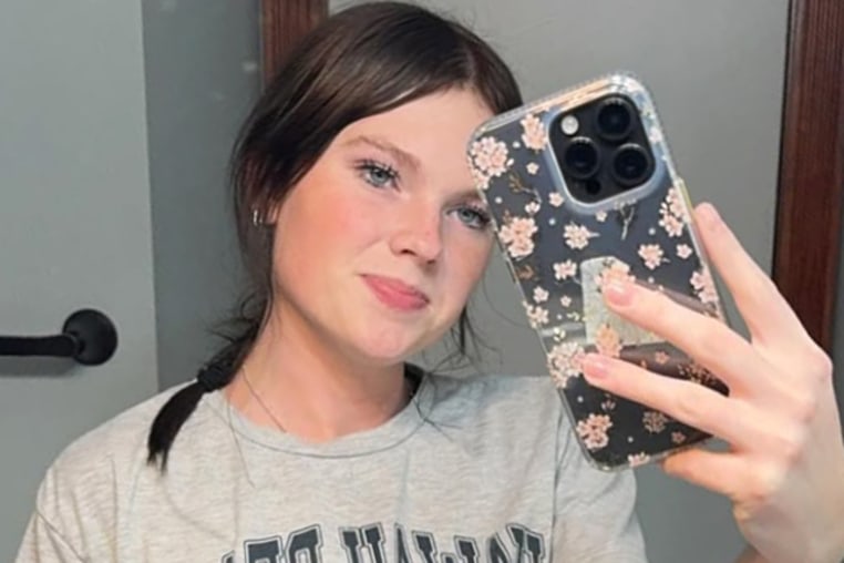 Anna Kepner takes a selfie in a mirror