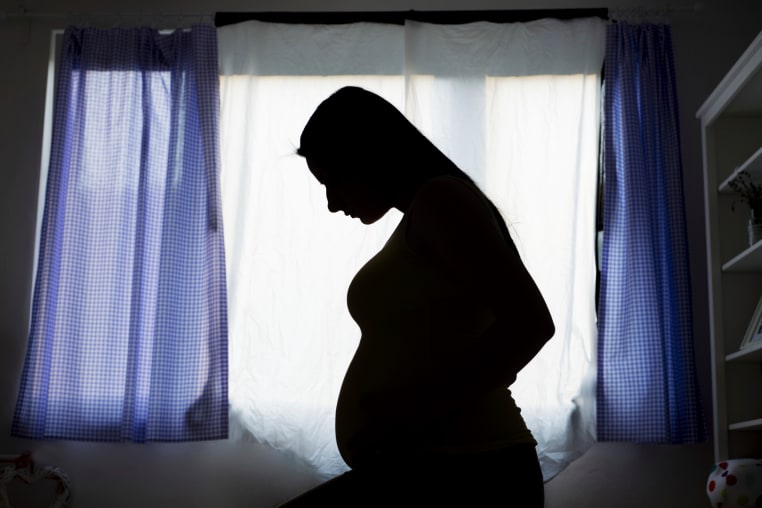 silhouette of pregnant woman