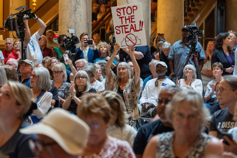 Demonstrators rally against redistricting on Sept. 18, 2025, inside the Indiana Statehouse.