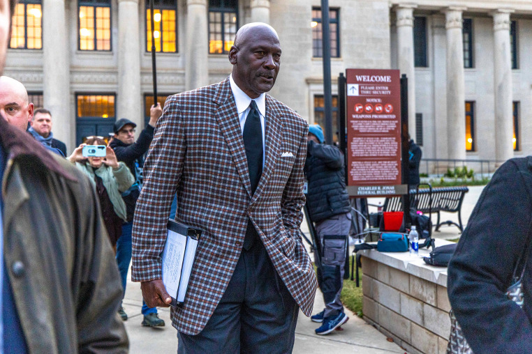 Michael Jordan walking to trial