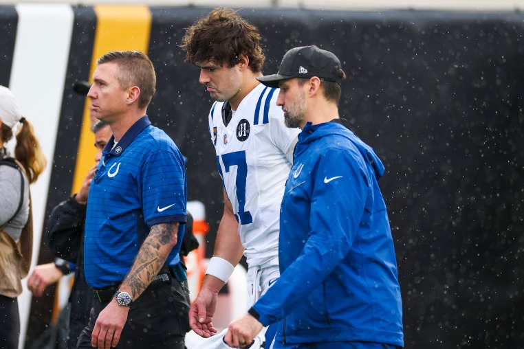 Daniel Jones of the Indianapolis Colts walks off the field after sustaining an injury
