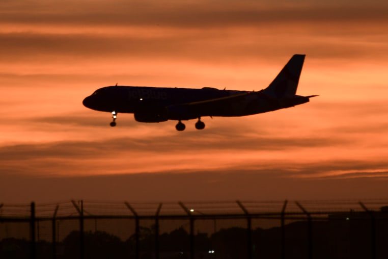Orange Sunset Seen At Orlando International Airport