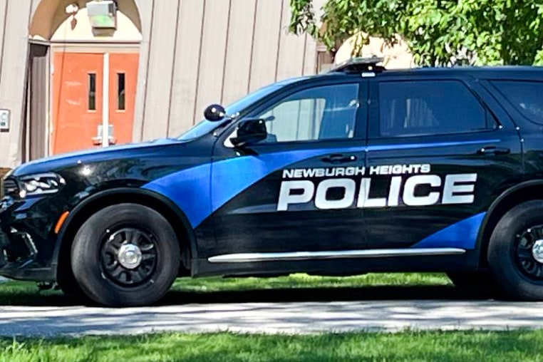 A Newburgh Heights police car parked outside