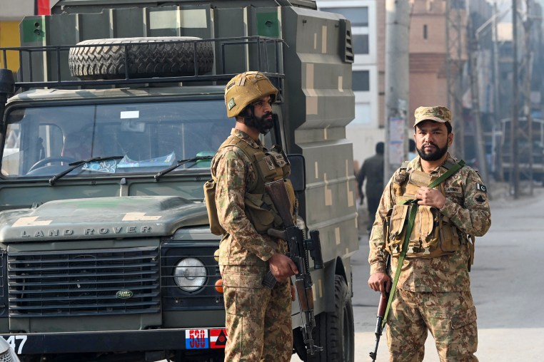 Security personnel stand guard 