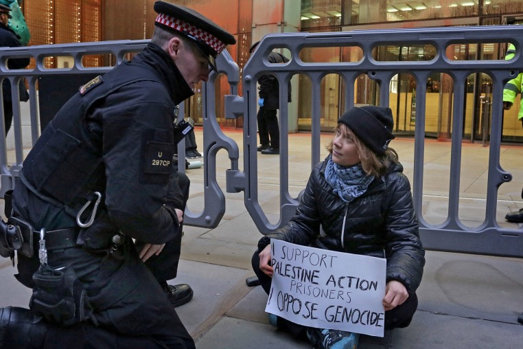 Swedish activist Greta Thunberg before her arrest outside the offices of Aspen Insurance in London on Dec. 23, 2025.