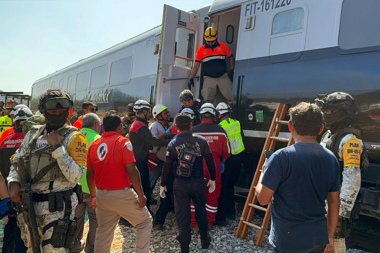 Mexican Army soldiers and Civil Protection members rescue passengers from the Interoceanic train that derailed in Nizanda, Oaxaca state, on the route to Coatzacoalcos, Mexico, on December 28, 2025. 