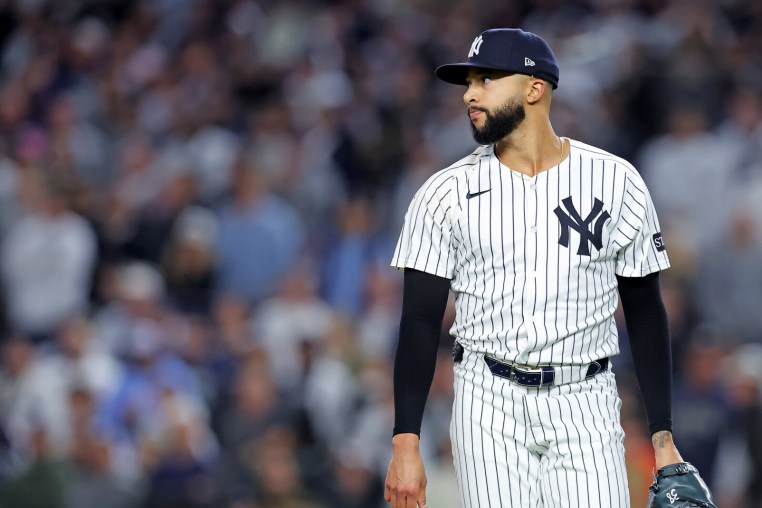 Oct 8, 2025; Bronx, New York, USA; New York Yankees pitcher Devin Williams (38) reacts after giving up a two run RBI during the seventh inning during game four of the ALDS round for the 2025 MLB playoffs at Yankee Stadium. Mandatory Credit: Brad Penner-Imagn Images