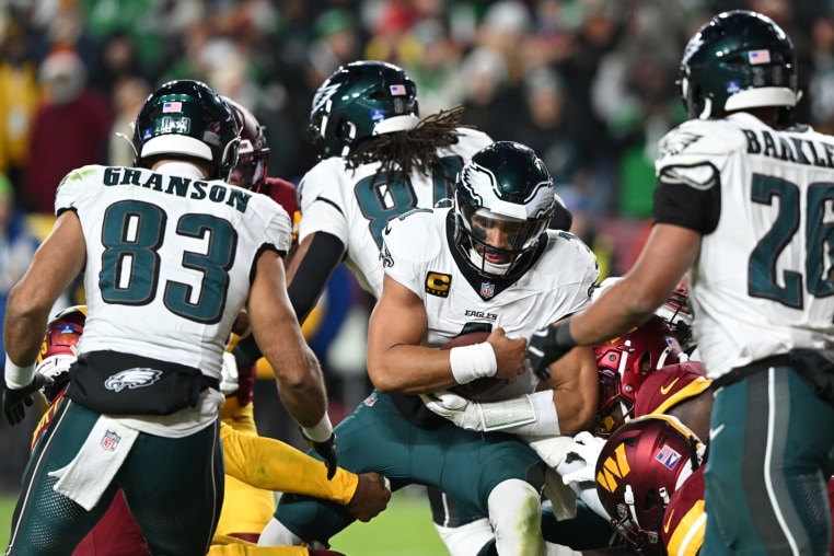 LANDOVER, MARYLAND - DECEMBER 20: Jalen Hurts #1 of the Philadelphia Eagles runs the ball against the Washington Commanders in the third quarter at Northwest Stadium on December 20, 2025 in Landover, Maryland. (Photo by Greg Fiume/Getty Images)
