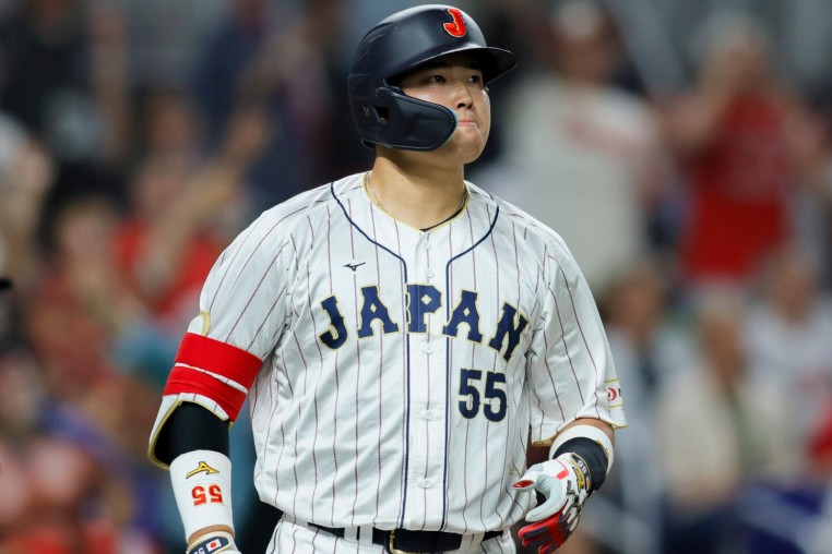 Mar 21, 2023; Miami, Florida, USA; Japan third baseman Munetaka Murakami (55) looks on after hitting a home run during the second inning against USA at LoanDepot Park. Mandatory Credit: Sam Navarro-USA TODAY Sports